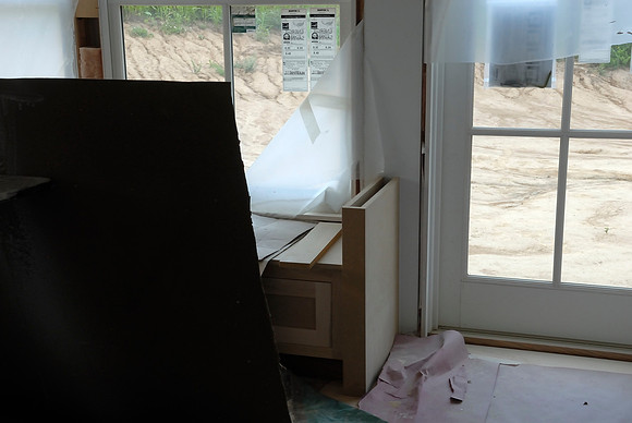 There's a window seat under there somewhere