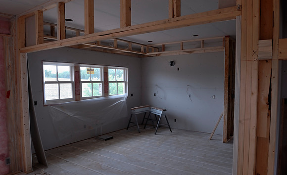 Drywall in kitchen; soffits framed
