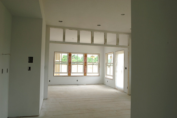 Walls are primed! Looking through kitchen to dining room