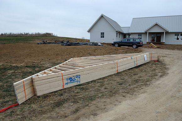 Garage trusses delivered; slab poured