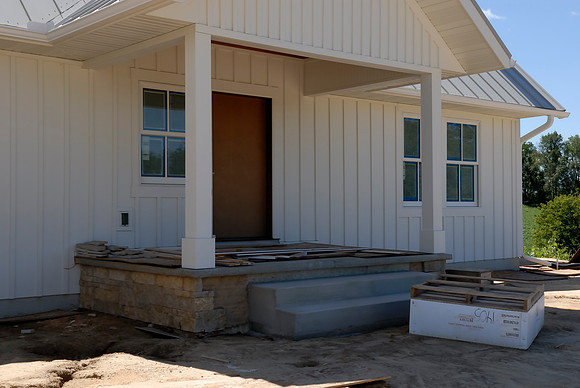 Stonework in process and new front steps