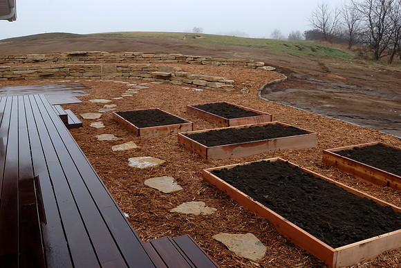 New raised beds, stepping stones and mulch